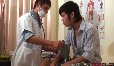 Fisted Asian twink jerking while barebacked by doctor