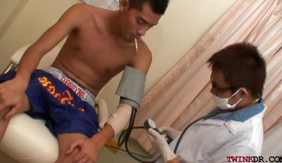 Examined twink Asian breeding his medic till making him cum