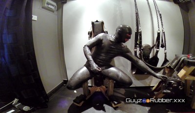 Guy in shiny rubber is bored during lockdown and finds different toys to fuck his hole with