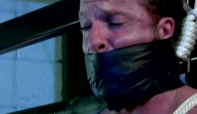 Derek is bound and has his balls pulled tight