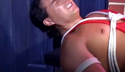 Muscular man Vincenzo is bound with rope